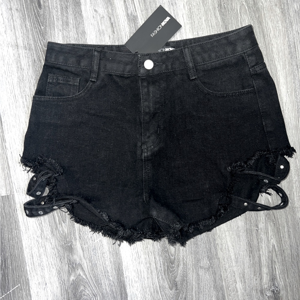 Black jean shorts with cut out sides